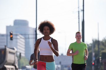 Image showing multiethnic group of people on the jogging