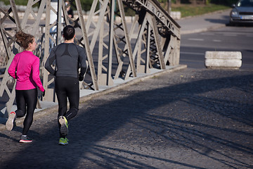 Image showing young  couple jogging