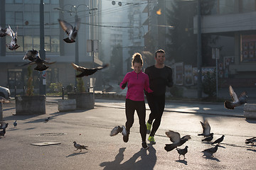 Image showing young  couple jogging