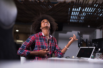 Image showing portrait of a young successful African-American woman in modern 