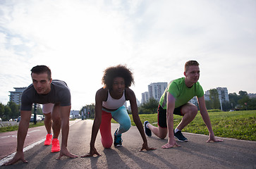 Image showing multiethnic group of people on the jogging