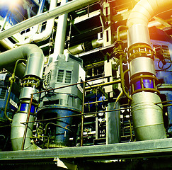 Image showing Pipes, tubes, machinery and steam turbine at a power plant