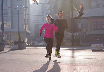 Image showing young  couple jogging