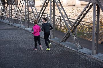 Image showing young  couple jogging