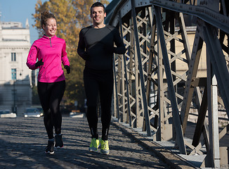 Image showing young  couple jogging