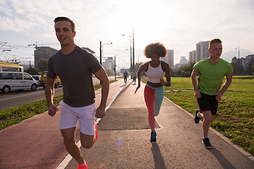 Image showing multiethnic group of people on the jogging