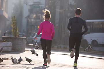 Image showing young  couple jogging