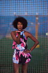 Image showing young African-American woman in a summer dress