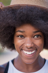 Image showing Close up portrait of a beautiful young african american woman sm