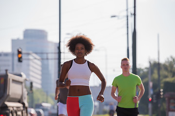 Image showing multiethnic group of people on the jogging