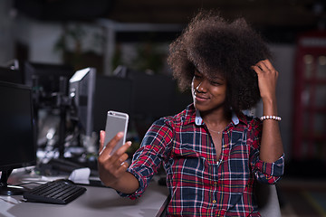 Image showing portrait of a young successful African-American woman in modern 