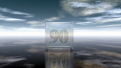 Image showing number ninety in glass cube under cloudy sky - 3d rendering