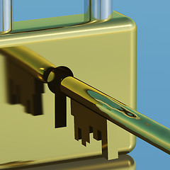 Image showing Padlock With Key Closeup Showing Security Protection And Safety