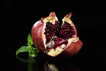 Image showing Pomegranade And Mint On Black