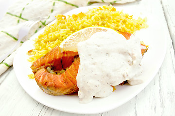 Image showing Salmon with rice on board