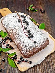 Image showing Fruitcake bird cherry with berries on board