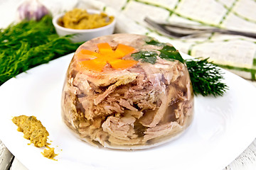 Image showing Jellied in plate with parsley on board
