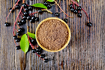 Image showing Flour bird cherry in bowl on board top