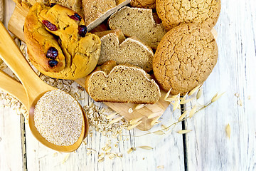 Image showing Bread and biscuits oat with bran on board top