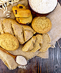 Image showing Bread and biscuits oat flour on dark board top