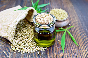 Image showing Oil hemp with flour on board