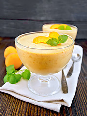 Image showing Jelly air apricot in glass bowl on napkin