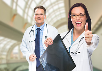 Image showing Doctors or Nurses Holding X-ray Inside Hospital