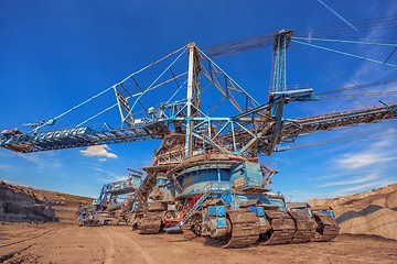 Image showing Large excavator machine in the mine