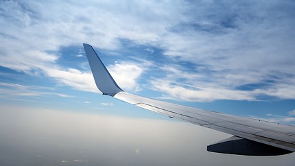 Image showing Airplane wingon the sky