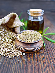 Image showing Flour hemp in bowl with oil on board