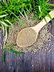 Image showing Flour hemp in spoon with leaf on board top