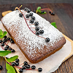 Image showing Fruitcake bird cherry on board