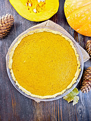 Image showing Pie pumpkin in pan on table top