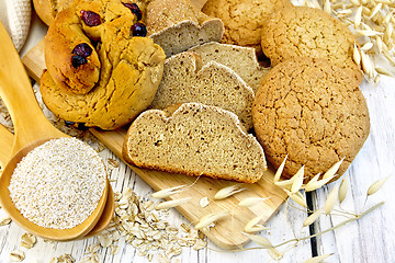 Image showing Bread and biscuits oat with bran on board