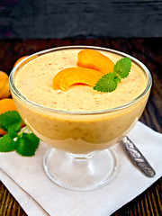 Image showing Jelly air apricot in glass bowl on dark board