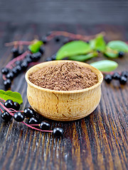 Image showing Flour bird cherry in bowl on board