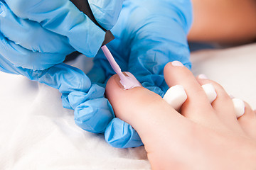 Image showing Specialist making pedicure 