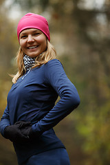 Image showing Sporty girl on autumn landscape