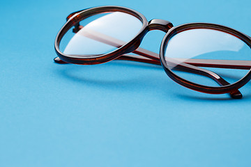 Image showing Folded round glasses close up