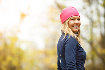 Image showing Smiling girl in pink hat