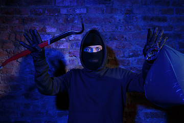 Image showing Thief with master key , bag