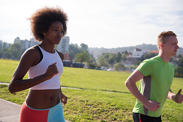 Image showing multiethnic group of people on the jogging