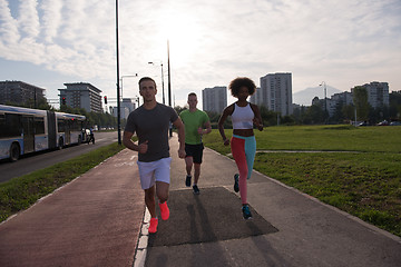 Image showing multiethnic group of people on the jogging