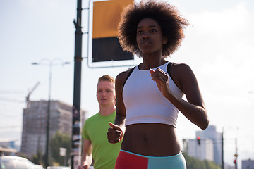 Image showing multiethnic group of people on the jogging