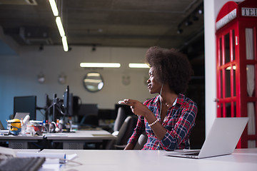 Image showing portrait of a young successful African-American woman in modern 