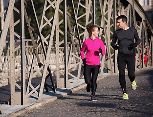 Image showing young  couple jogging