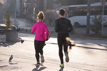 Image showing young  couple jogging