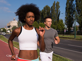 Image showing multiethnic group of people on the jogging