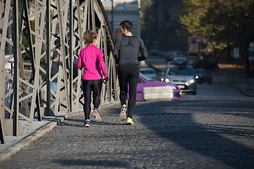 Image showing young  couple jogging