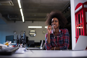 Image showing portrait of a young successful African-American woman in modern 